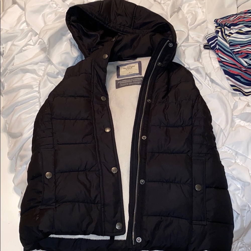 Black puffer vest with hood